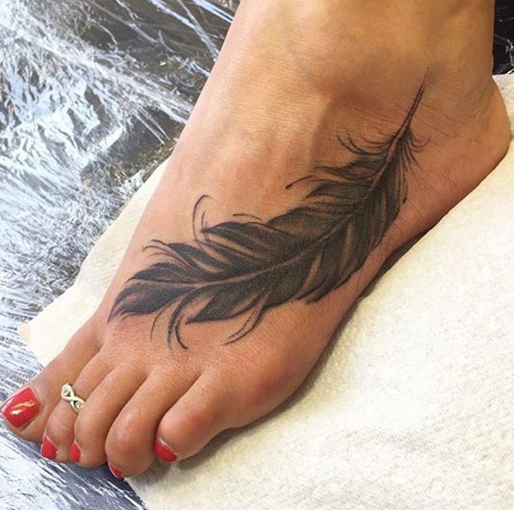 foot tattoo feather
