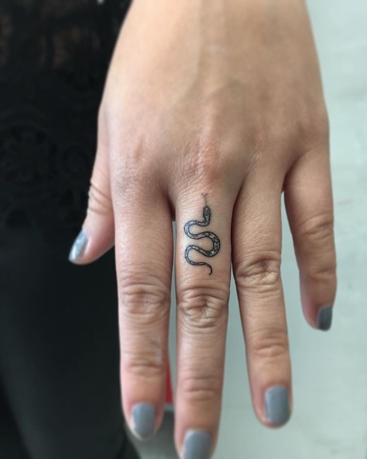 snake tattoo finger
