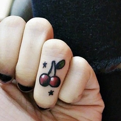 cherry tattoo hand finger