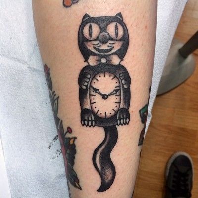 Kit-cat tattoo