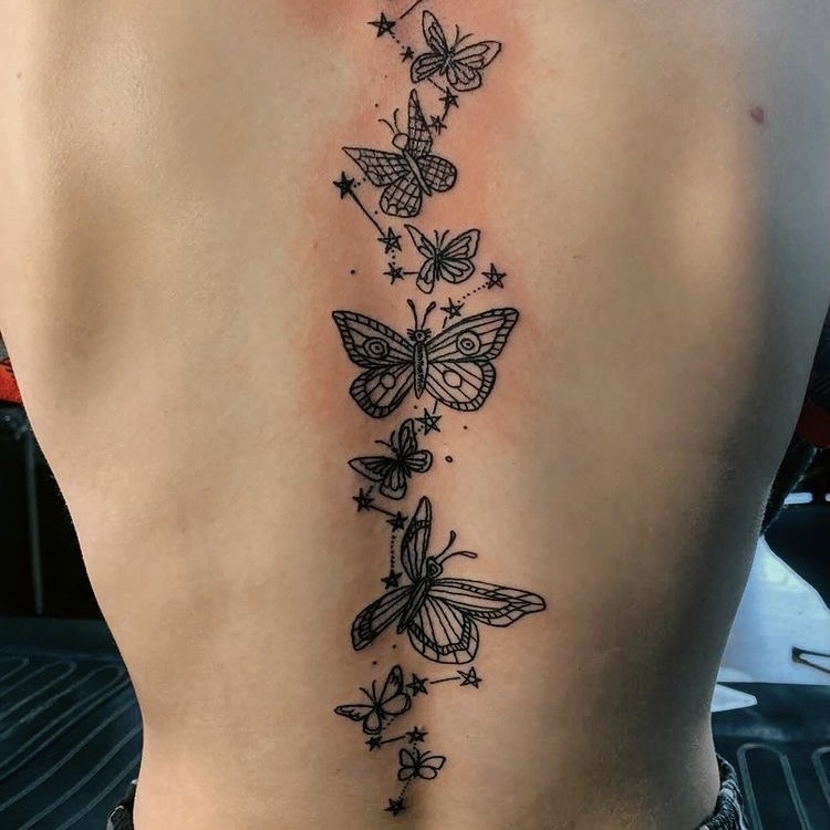 butterfly spine tattoo